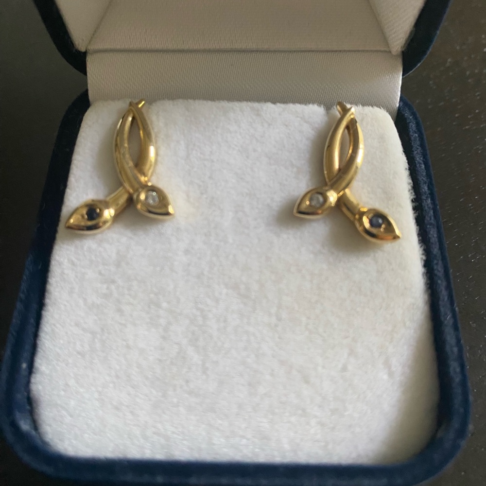 NWOT Gold earrings with sapphire and diamond stone.